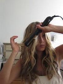 We will tell you how to curl your hair with ironing